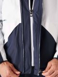 Waterproof coat in navy and white with a double zip part of the X-Series range by Quba & Co